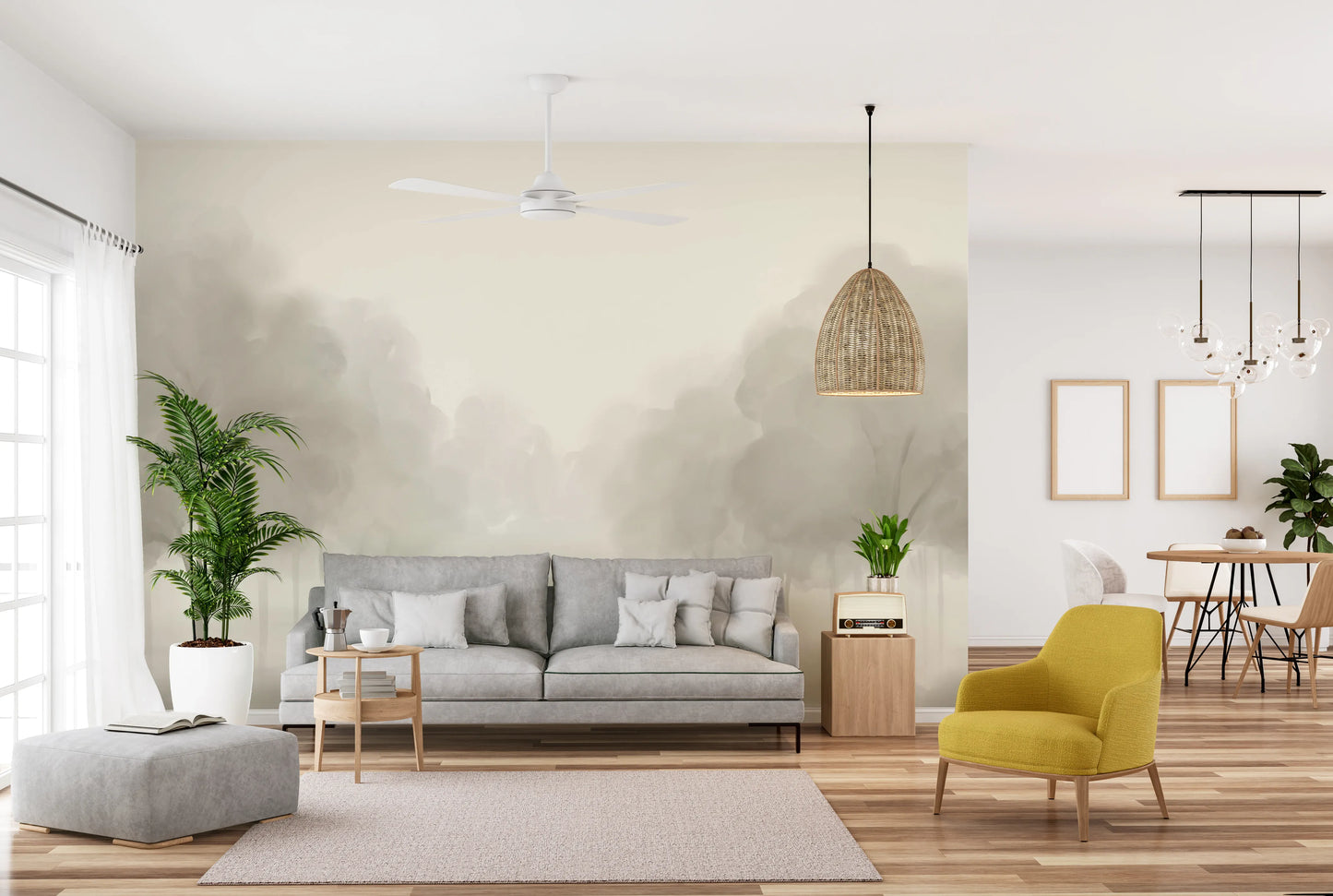 Soft beige Whispering painted tree landscape wall mural in open living area.