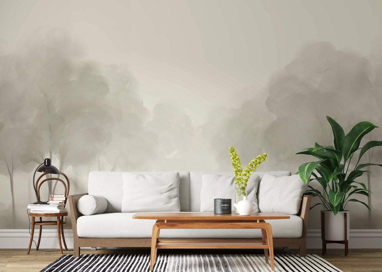 Whispering Blooms Wall Mural with soft grey tree landscape in living room.