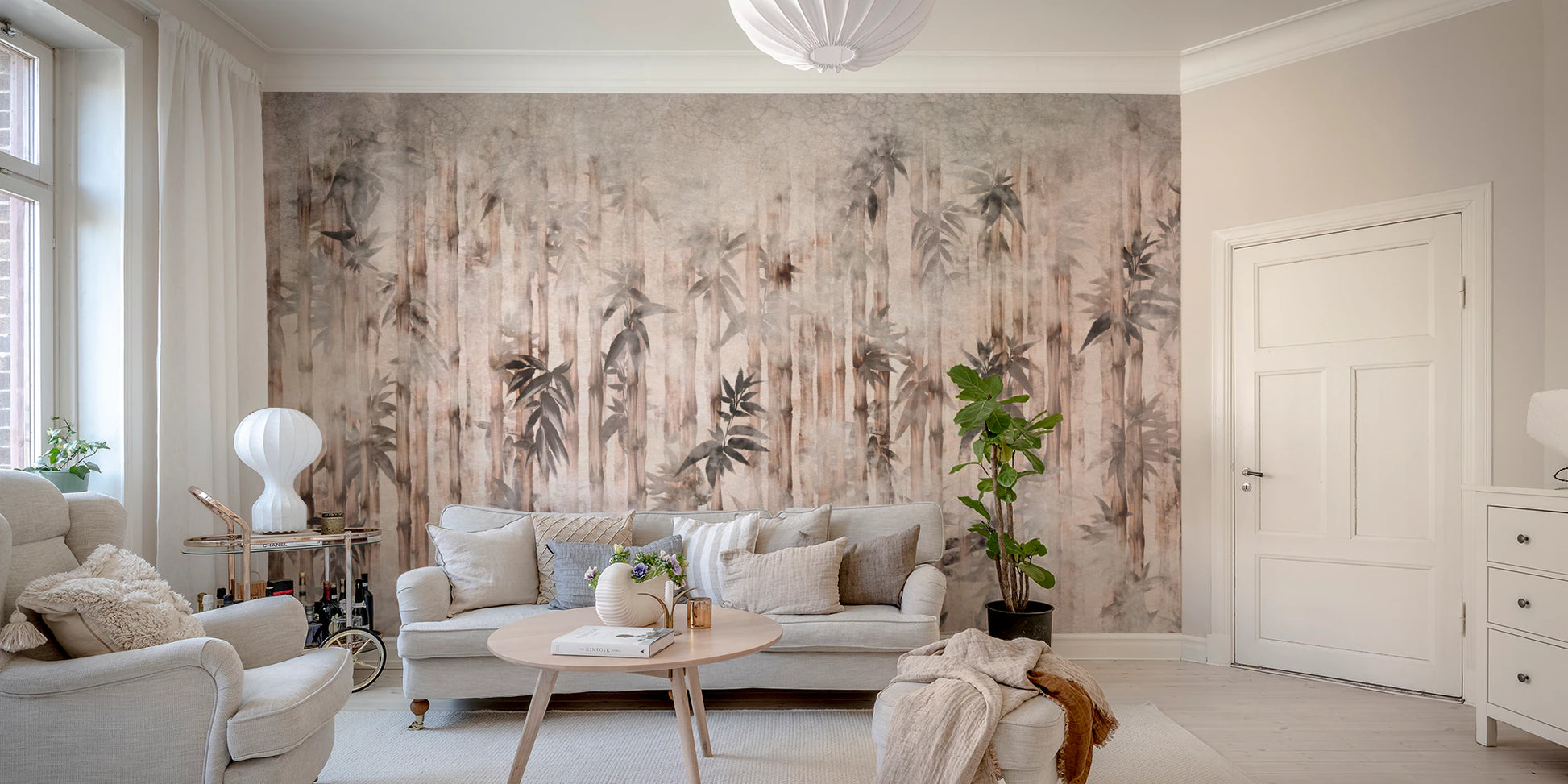 Neutral coloured wall mural showcasing a hazy bamboo grove in living room.