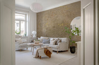 Gilded mandala tapestry mural with beige tone in living room.
