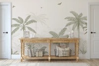 Sketched tropical wall mural showing tall palms, banana leaves and flying birds.