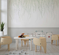 Nursery wall featuring soft sage green hanging vines mural.