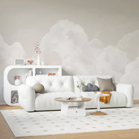 Cloud wall mural with soft natural light in bright living room.
