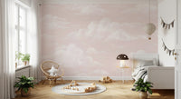 Watercolor cloud mural for kids room with blush sky and white clouds. 