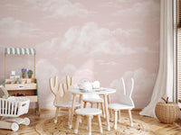 Pink sky wall mural with layered white clouds in a calm pastel tone. 