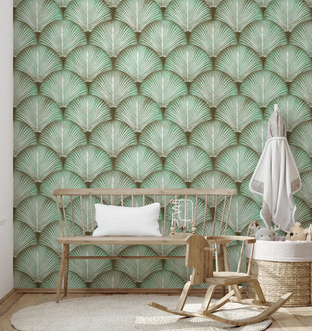 Scallop fan frond wallpaper as a fresh accent in a nursery space.