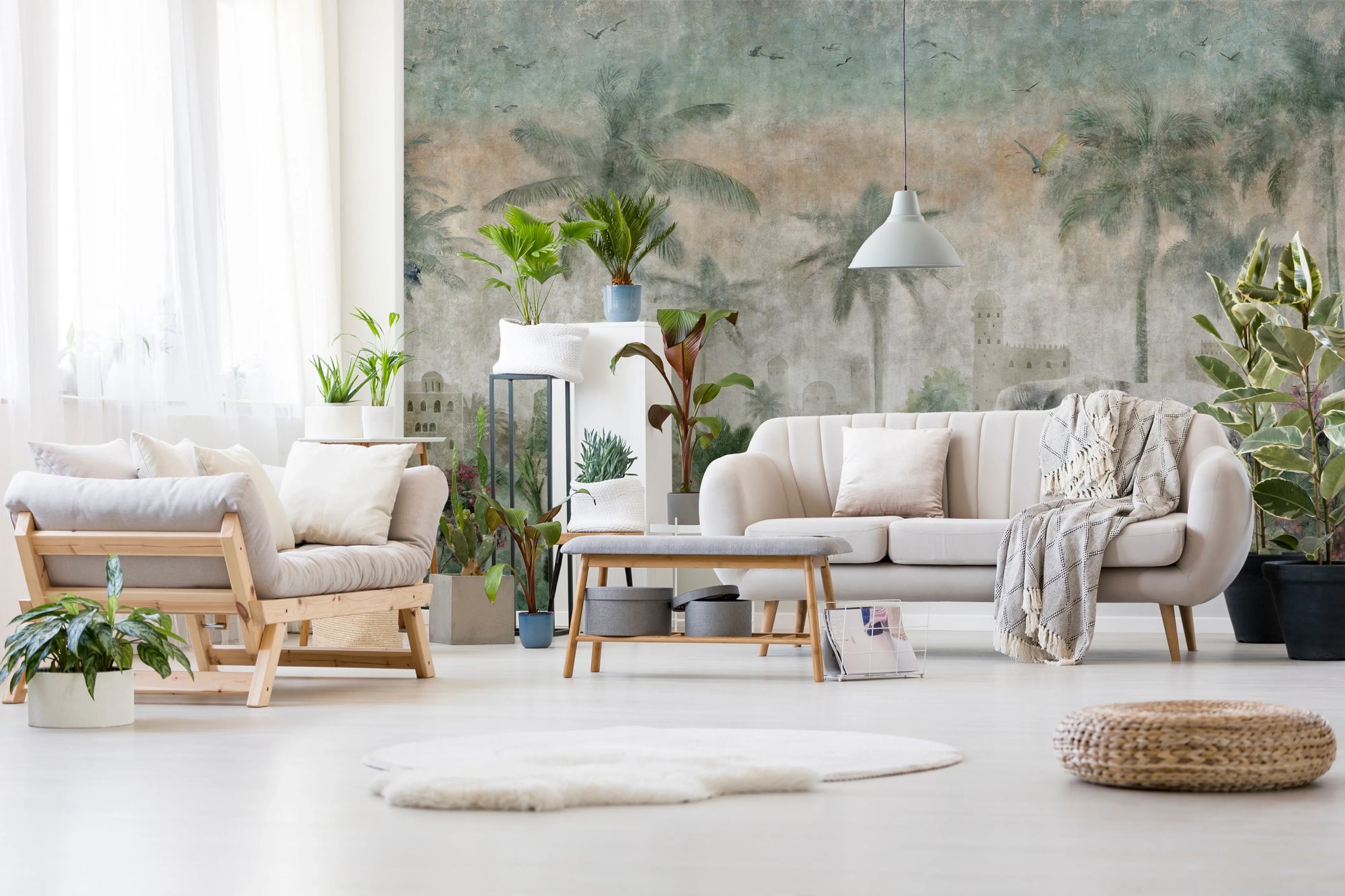 Elephant oasis wall mural displayed in a living room space.