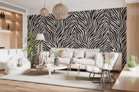 Monochrome stripe mural across a living room wall in bold black lines