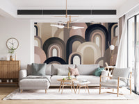 Earth tone arch mural on a living room feature wall in blush and taupe