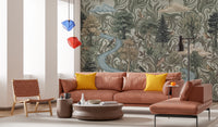 Green forest mural in a living room with trees, birds, and woodland animals