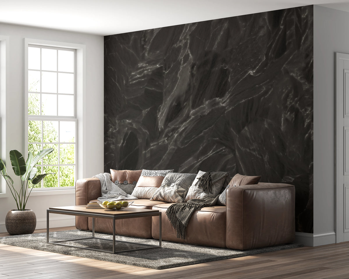 Dark charcoal stone texture mural with silver mineral veins in living room