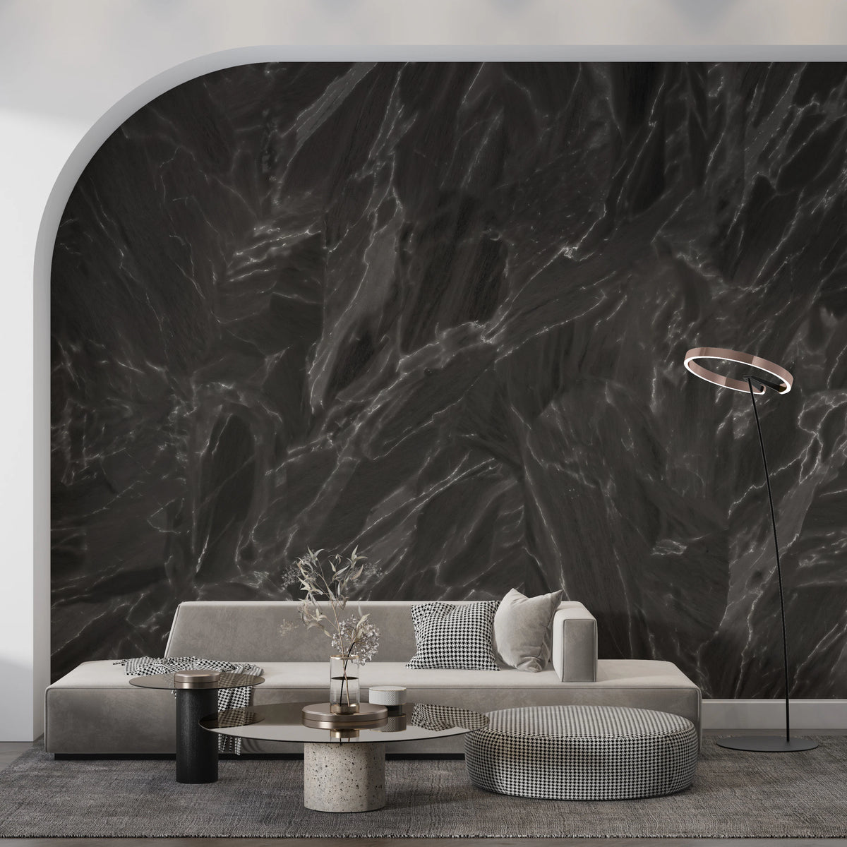 Black stone surface mural with jagged mineral vein lines