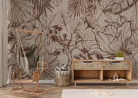 Tropical leaf sketch mural in brown linework over a beige backdrop 