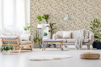 Vintage bird and branch wallpaper styled in a living room