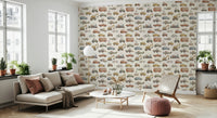 Vintage cars, sailboats, and biplanes on a soft cream vehicles wallpaper in living room