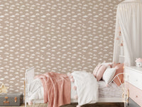 Neutral cloud wallpaper with fluffy white clouds scattered on taupe in bedroom