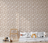 Beige wallpaper with simple white clouds in a soft, dreamy layout on kids room wall