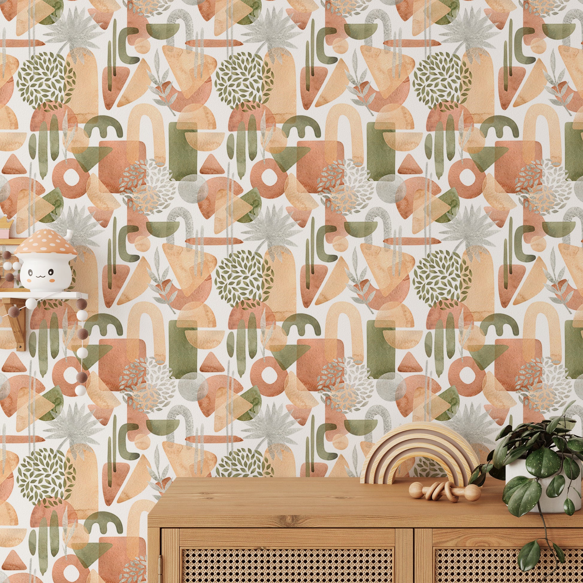 Abstract watercolor shapes in warm pastel tones.