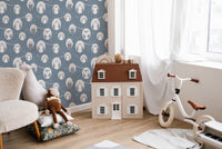 Repeating design of owls, trees, and burrows in a colorful pattern