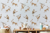 Fun repeat pattern wallpaper featuring playful monkeys