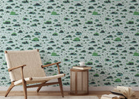 Nature-inspired wallpaper showcasing bushes and scattered footprints
