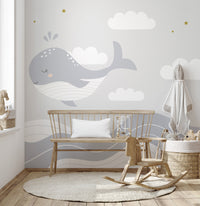 Serene ocean-themed mural with a whale
