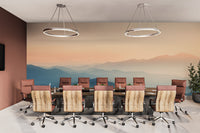 Foggy mountain scenery wallpaper with golden sunrise
