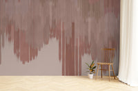 Artistic wall mural featuring a pink fading abstract design
