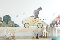 Adorable bunny enjoying a ride wall mural
