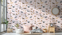 Dog lovers' pale pink wallpaper with charming breed motifs
