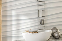 Marble wave wall mural in a bathroom wall mural with glass partition.