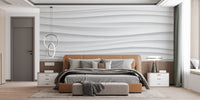 3D white marble wall mural in a minimalist bedroom setting.