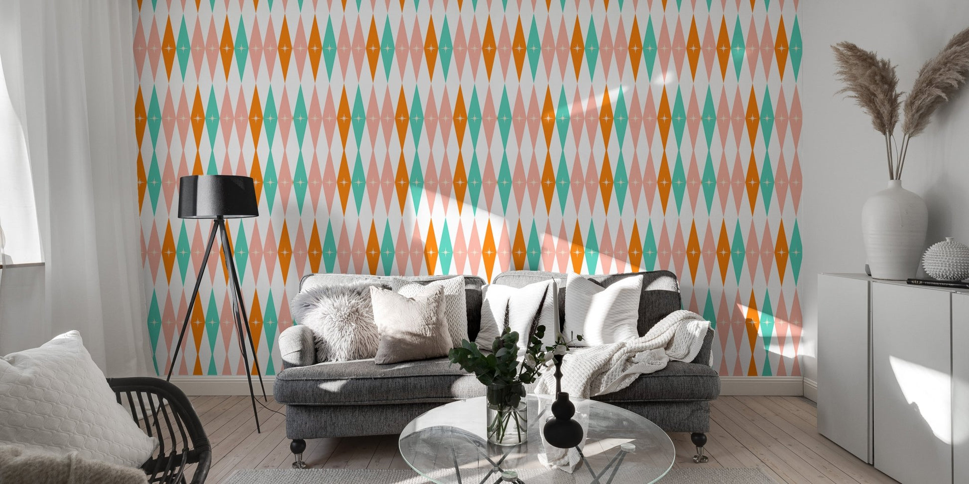 Modern living room with grey sofa and large retro diamond pattern wall mural.