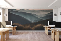 Foggy mountain view with sunrise
