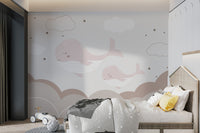 Dreamy wall mural with sleepy whales and clouds