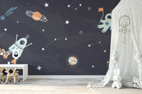 Space mural showing rockets and galaxies
