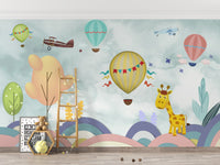 Multicolor wallpaper with balloons and planes.
