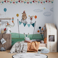 Playful animals wall mural with a fun circus theme.
