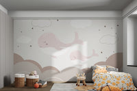 Tranquil mural with whales drifting in the clouds