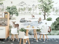 Scenic forest mural featuring deer in a snowy setting.
