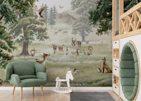 Scenic mural showcasing forest animals and nature fun.

