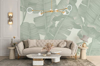 Seamless banana leaves wall mural with floral accents