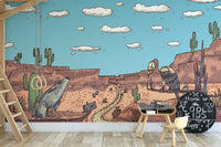 Vibrant desert mural featuring safari animals and landscapes.
