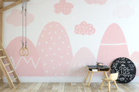 Pink misty mountains wall mural creating a tranquil ambiance.
