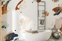 Self-adhesive mural with bold inkblot patterns for unique walls.
