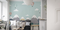 Scenic mountain mural with vibrant balloons and gentle clouds.
