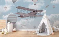 Kids' mural featuring a whimsical and colorful flight of fancy.
