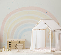 Artistic wall mural featuring watercolor brushstroke designs.
