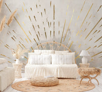 Golden sun rays bursting from the horizon in an abstract wallpaper mural.