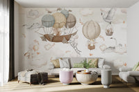 A dreamy sky mural with animals on hot air balloons and ships.